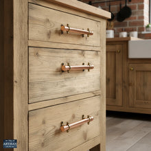 Charger l'image dans la galerie, 22mm / 28mm Copper Pull Handles | Show this handle on draws in a rustic kitchen setting.