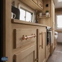 Charger l'image dans la galerie, 22mm / 28mm Copper Pull Handles | Show this handle in a canpervan kitchen setting on draws and doors.